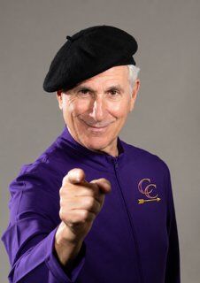 DW Starr, Confidence Crusader, in his purple shirt and black beret